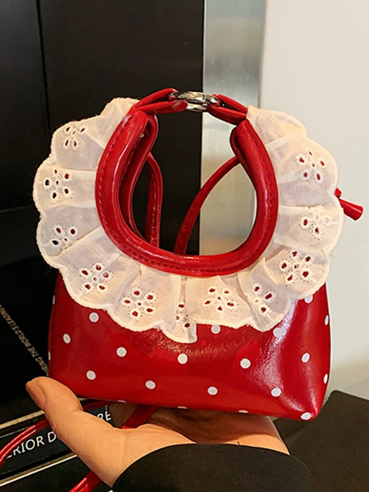 

Classic style mini bag. Designer's new single-shoulder crossbody bag. Design with spots. Retro leather surface.