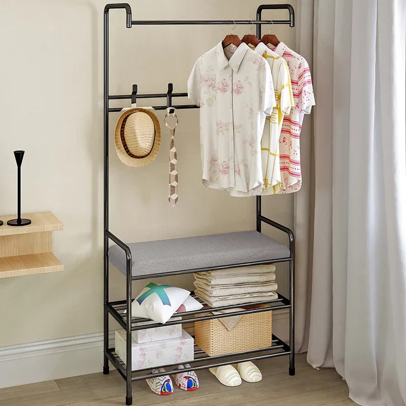 

Hanger on the floor, simple clothes rack integrated into the entrance and foyer of the bedroom