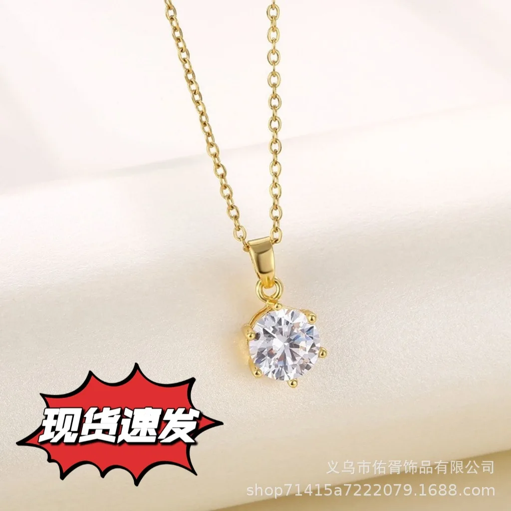 Minimalist constellation-inspired alloy pendant necklace with gold-toned plating, featuring delicate six-prong zircon setting on