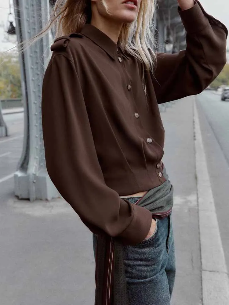 النمط الأوروبي والأمريكي موضة جديدة تصميم الملابس النسائية قميص مزخرف بحزام الكتف متعدد الاستخدامات