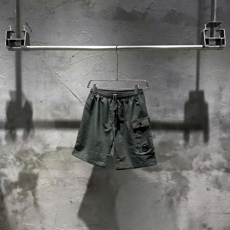 Tide Street Style Модные функциональные стильные быстросохнущие шорты Свободные повседневные повседневные шорты для пар с пятью брюками Мужские спортивные шорты