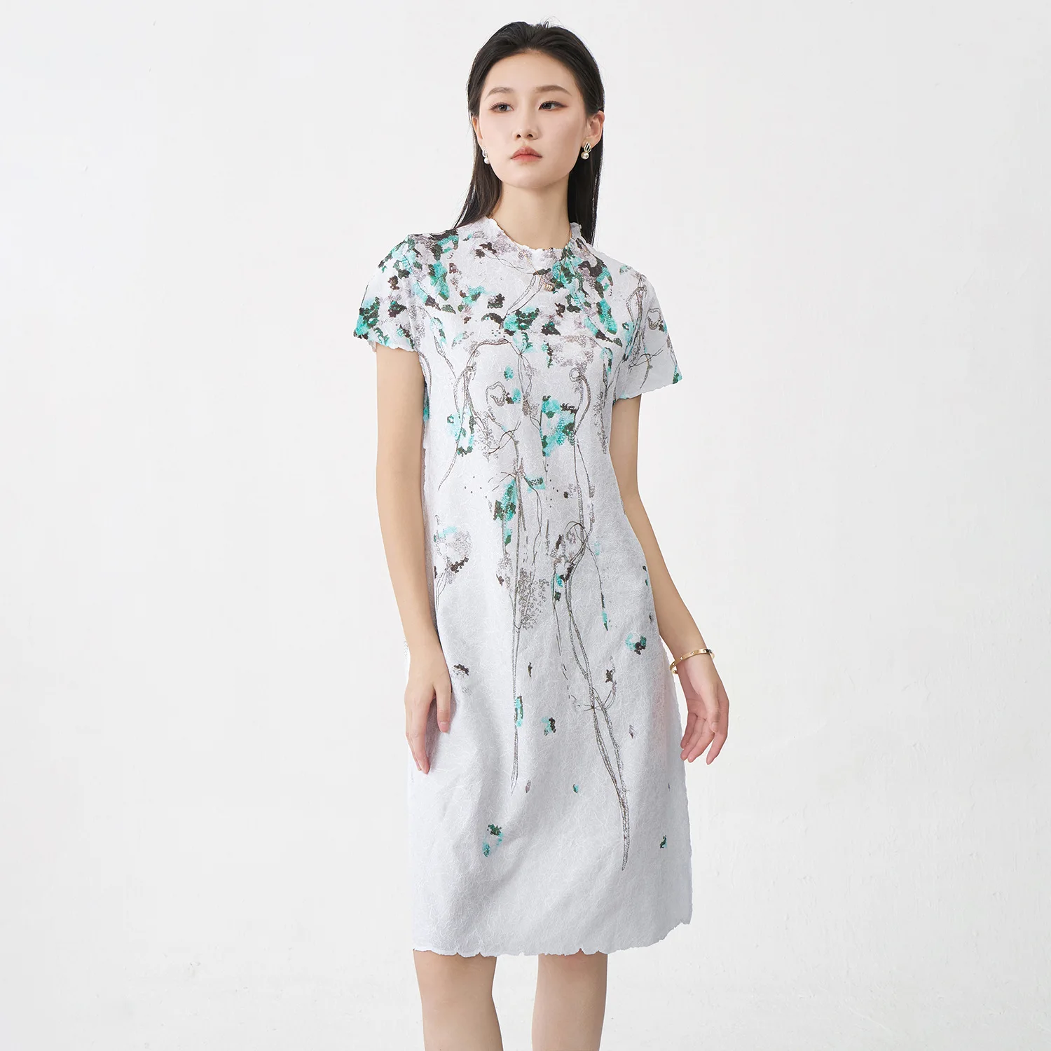 

Miyake Pleated New 2025 Women's Spring Dress with High-end Printed Short Sleeved Design, Flat and Messy Pleated Mid Length Skirt
