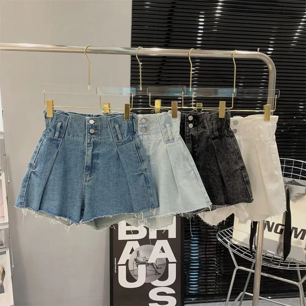 Denim shorts women\'s summer 2024 new Korean version of high waist buckle washed raw edges loose Joker slim hot pants.