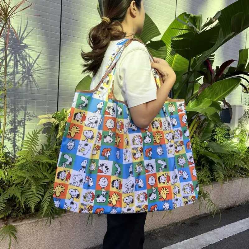 Nuovo Kawaii Miniso Cartoon Snoopy Mickey Cinnamoroll Kuromi Pompompurin Shopping Bag borsa da viaggio portatile pieghevole di grande capacità