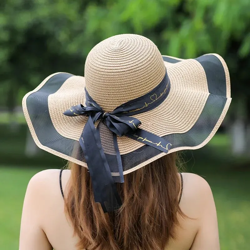 Sombrero de paja de playa para mujer en verano estilo coreano sombrero con protección solar de ala grande sombrero de playa de vacaciones de moda versátil