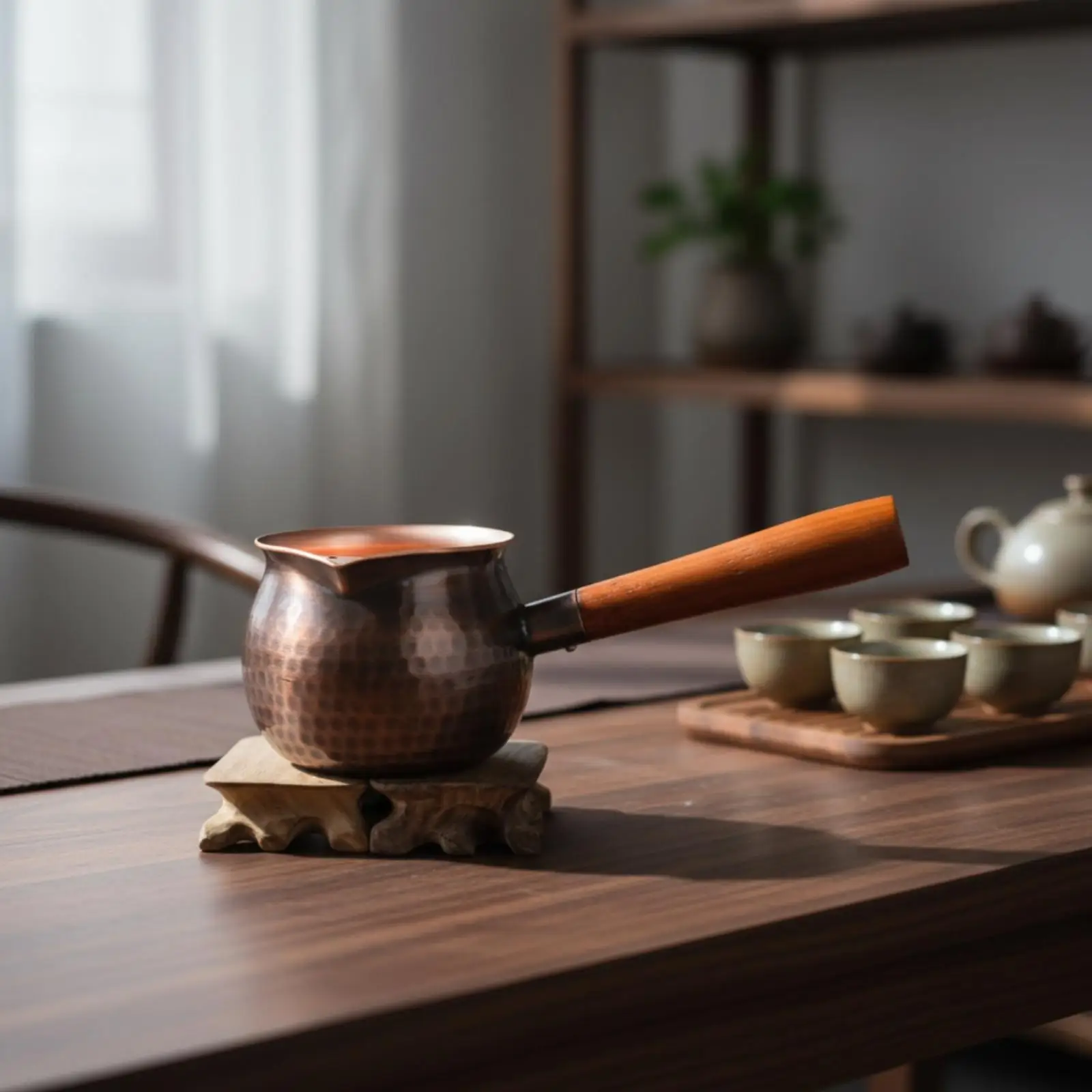 Artisan Hammered Copper Pouring Vessel with Dedicated Spout and Wood Handle for Morning Tea Display