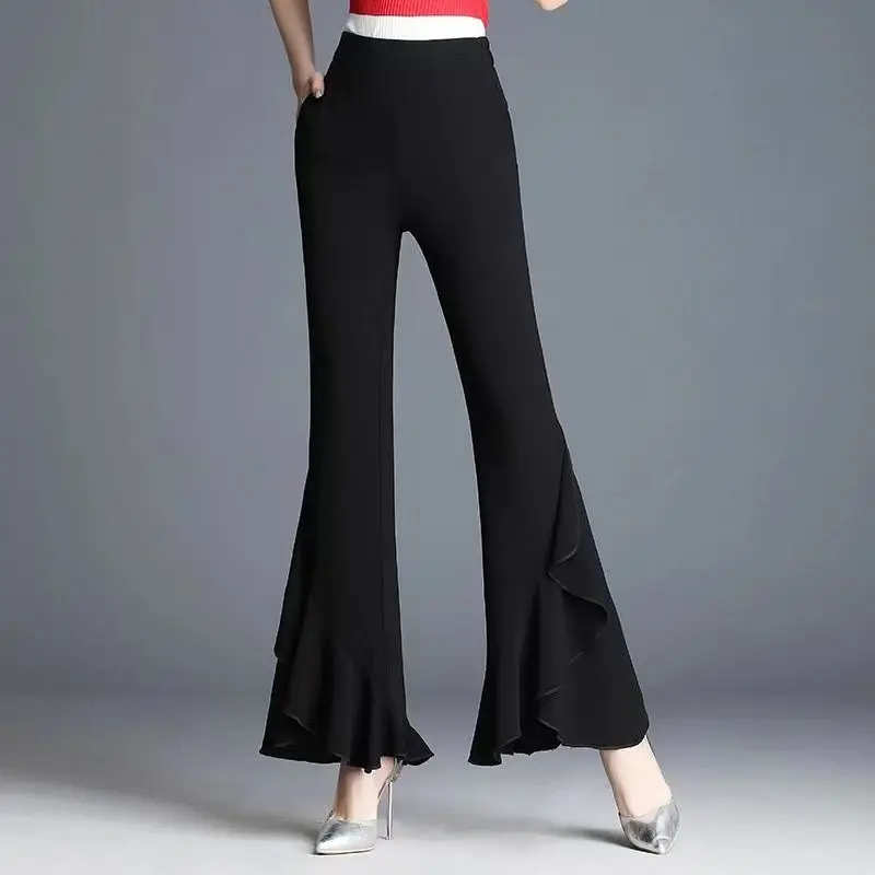 Primavera outono nova cor sólida moda cintura elástica bell-bottoms feminino high street cintura alta babados retalhos calças all-match