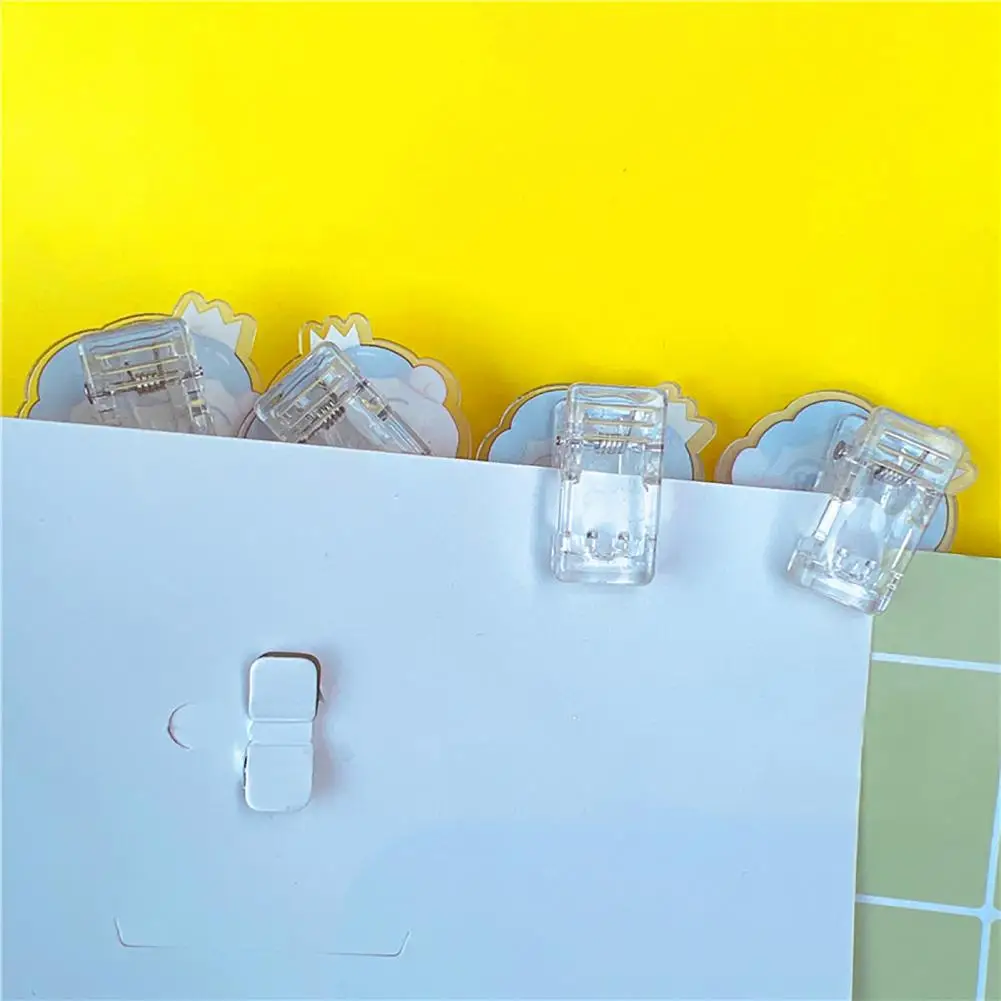 คลิปหนีบกระดาษแขวนผนังแบบหนีบขนาดกะทัดรัดทนทานมีกาวในตัวหนีบติดผนังอเนกประสงค์สำหรับแขวนภาพต่างๆ