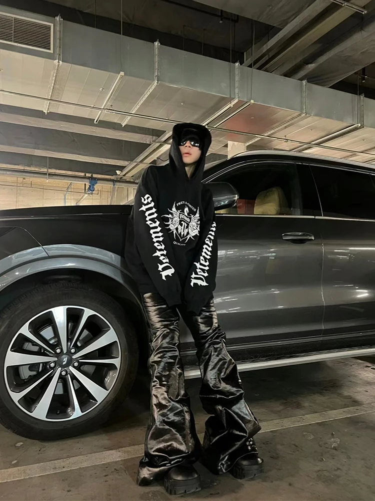 High Street RO Style Men's Dark Coated Glossy Patent Leather Black Jeans with Wide Legs and Floor Length, Slightly Flared Pants