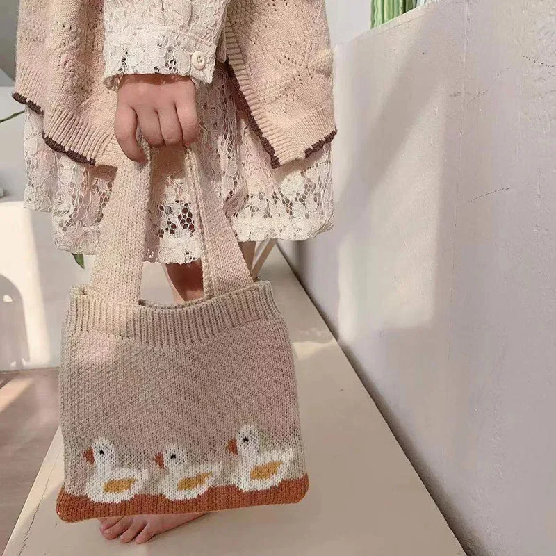 Bolso pequeño de punto con dibujos de pato para niños y niñas, bolsa de almacenamiento portátil para aperitivos y monedas, estuche para Otoño e Invierno