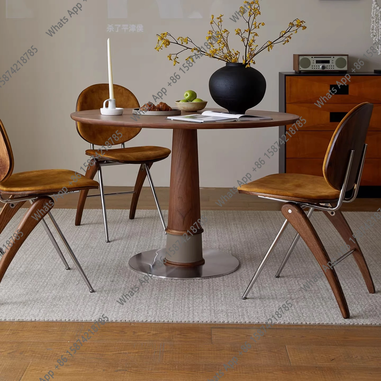 

Modern simple North American black walnut solid wood round dining table Nordic household small apartment dining table round