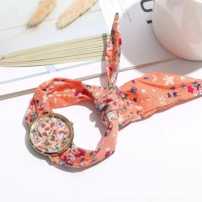 นาฬิกาข้อมือผ้าแฟชั่นใหม่สำหรับผู้หญิงนาฬิกาข้อมือเสื้อผ้ากุลสตรีแฟชั่นนาฬิกาควอตซ์ลายดอกไม้นาฬิกาสายผ้าผู้หญิงหวาน