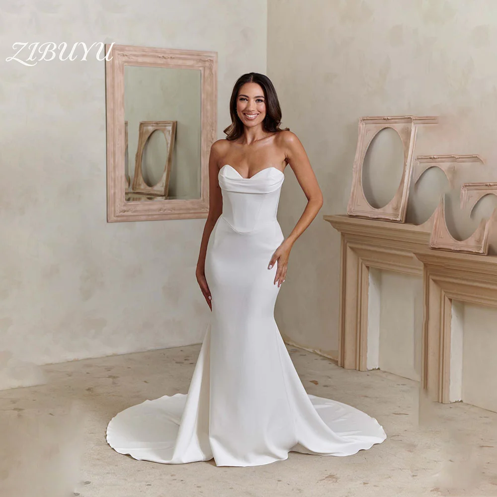 

Свадебное платье ZIBUYU на заказ: элегантное, роскошное, без бретелек, с вырезом «сердечко», без рукавов, длиной в пол, из атласа, фасон «русалка»