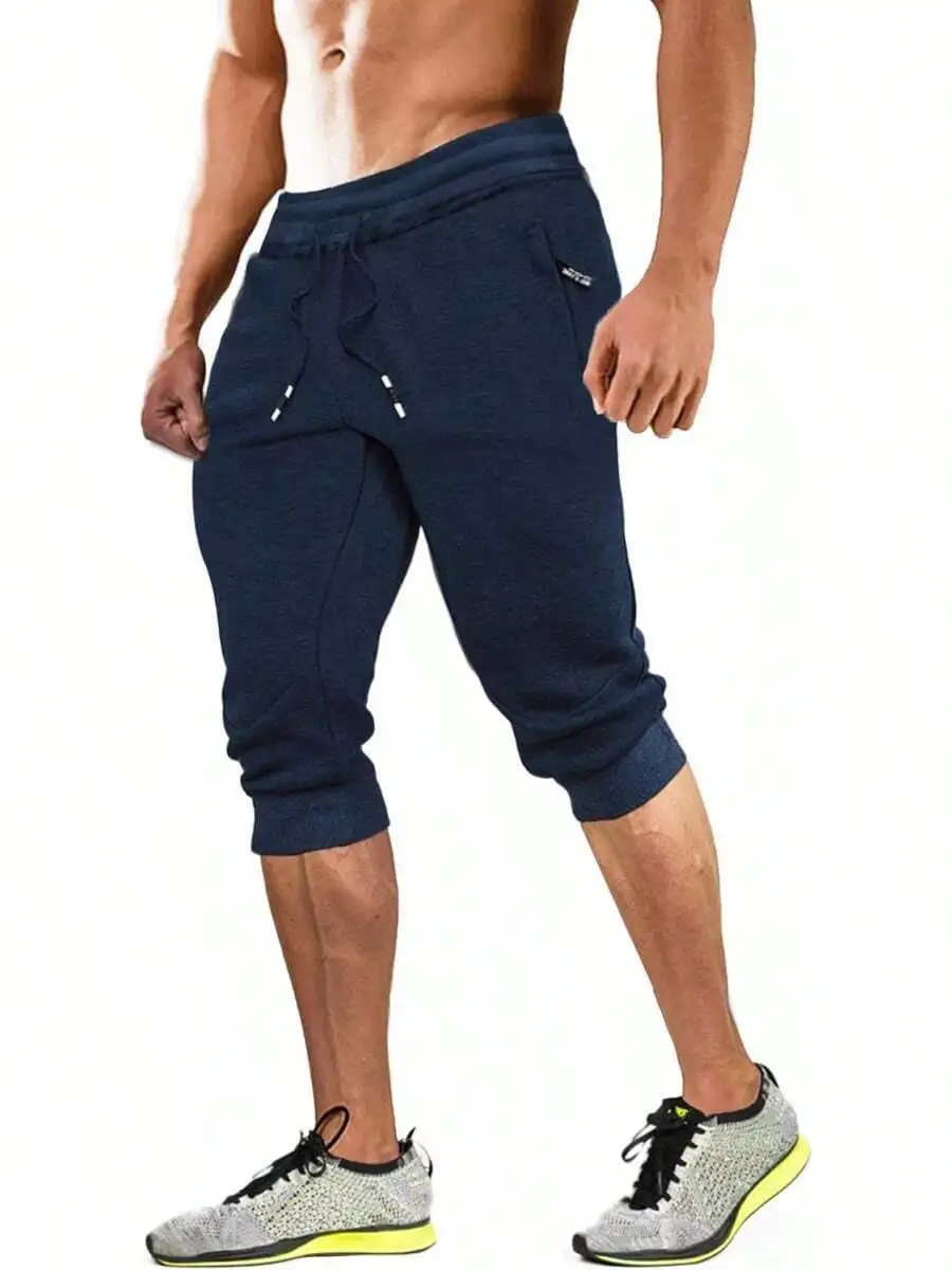 

Mens 3/4 Jogger Pants With Zipper Pockets Elastic Waist Breathable Cotton Blend Workout Shorts