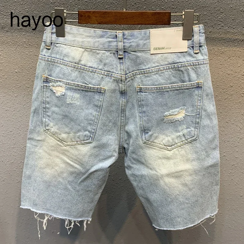 

Ripped denim shorts men's light blue fifth pants trendy all-match men's loose woolen shorts Men's split stitching short jeans