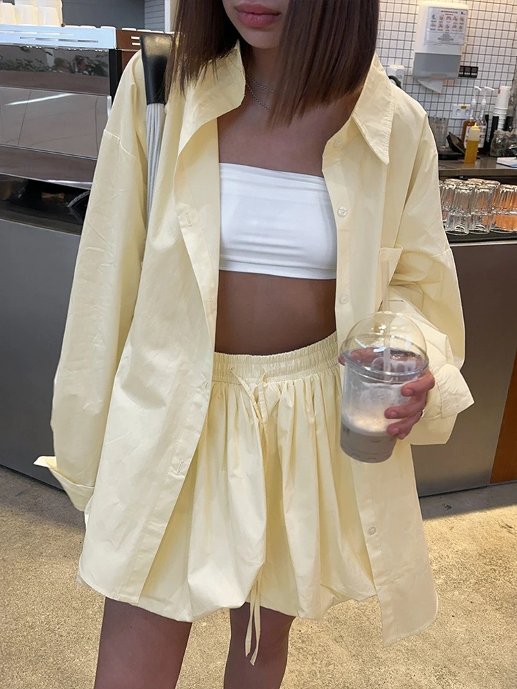 

Womens Spring Summer Loose Shirt Short Skirt Set Yellow Shirt Tie Belt Peplum Skirt Two Piece Set Versatile Minimalist Skirt New