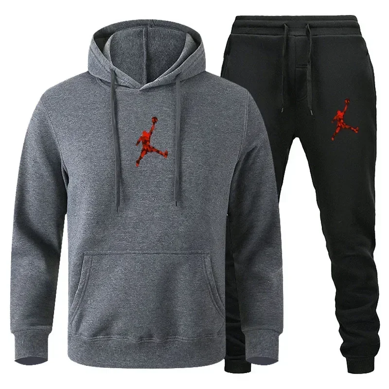 

A set of two-piece men's sportswear, including a hooded sweatshirt and sports pants, suitable for jogging in autumn and winter a