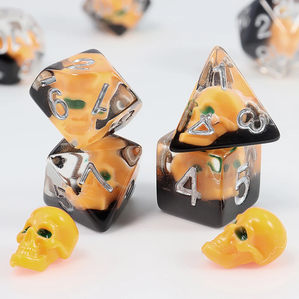 A Set of Pumpkin-Colored Skull Core-Spun Resin Dice, Halloween Multi-Element Ensemble Dice, Various Game Accessories and Supplies