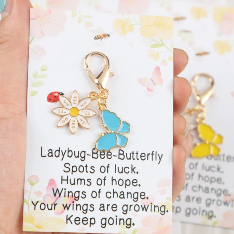 Lot de 8 porte-clés 2D mignons sur le thème des animaux (papillons et marguerites) avec carte de motivation papillon – Cadeau porte-bonheur actif