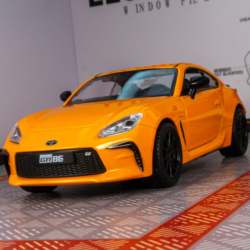 As portas modelo de carro em liga Toyota GR86 1:28 podem ser abertas tem funções de som e iluminação simuladas, detalhes ricos, acabamento fino
