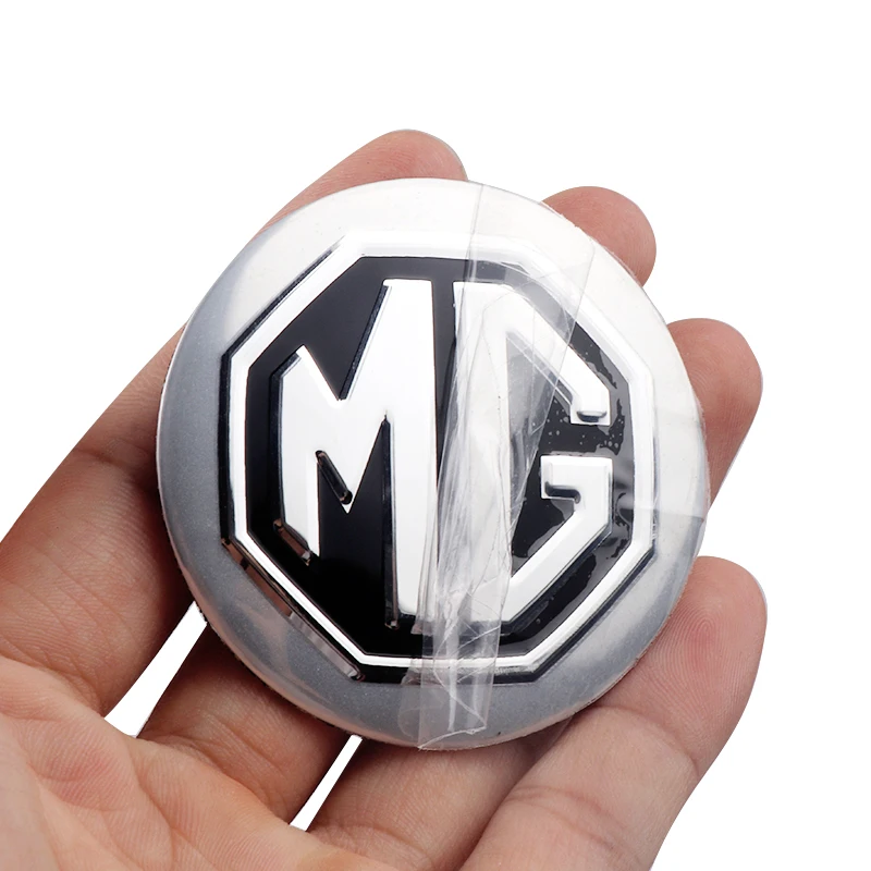 4 قطعة عجلة السيارة مركز محور قبعات شارة ملصق ديكور الشارات لموريس المرآب MG ZS 7 6 Cyberster MG4 EV ES5 HS واحد GT GS MG3 MG6