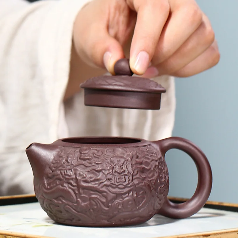 2026 Yixing Purple Clay Purple Xianglong Xishi pot embossed tea set purple sand teapot Yixing handmade teapot