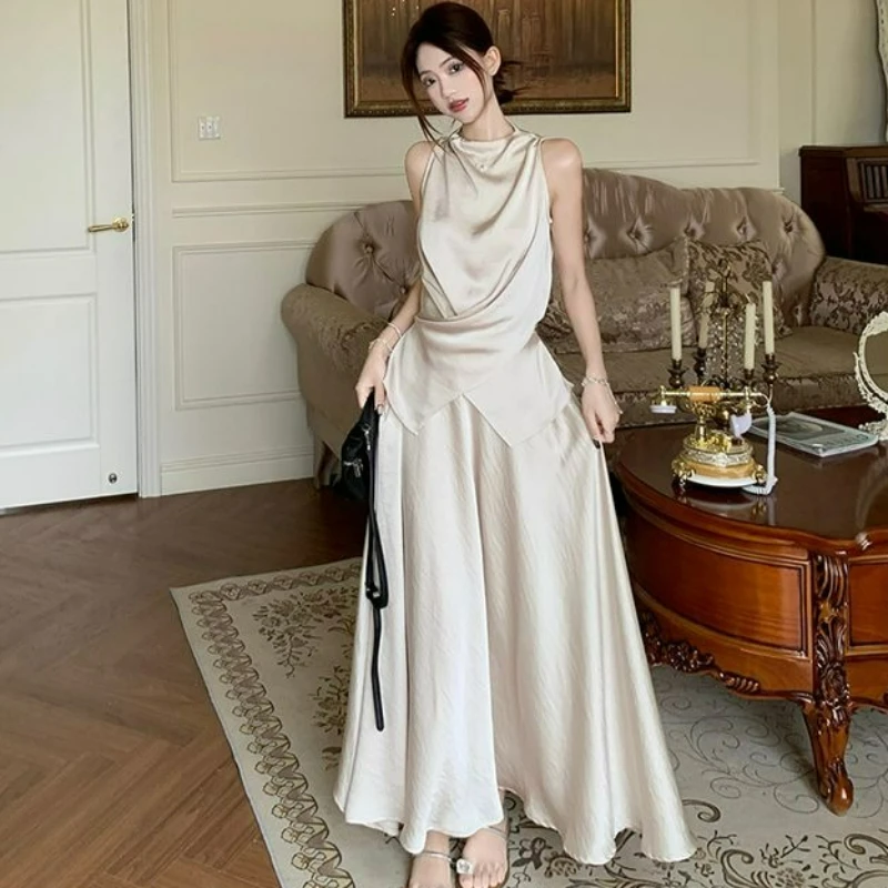 A Trendy Two-piece Set for Women's Commuting in The Summer of 2026 Featuring An Irregular Lace-up Design Satin Tank Top Skirt