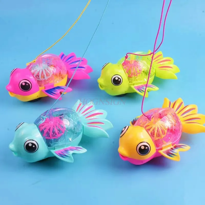 Rope pulling electric goldfish, music and lighting, universal walking, children's toy, rainbow fish