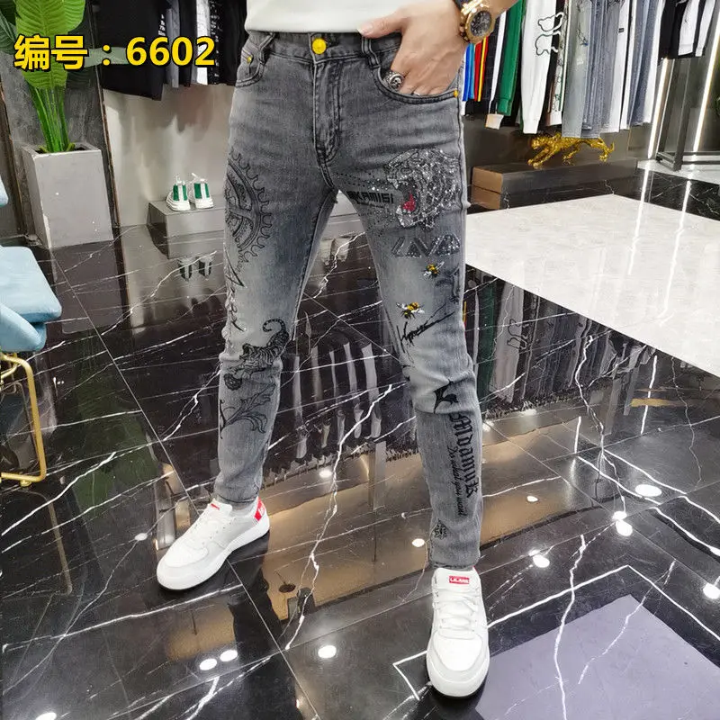 Harajuku موضة الشارع الشهير الجينز الرجال العلامة التجارية العصرية مطاطا عادية نحيل الجينز السراويل الشباب الكورية بسيطة سليم ورقيقة السراويل
