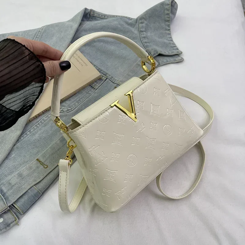 Torebka typu bucket bag z lakierowanej skóry premium na rok 2025, duża pojemność, luksusowa torba do pracy, na ramię lub crossbody.