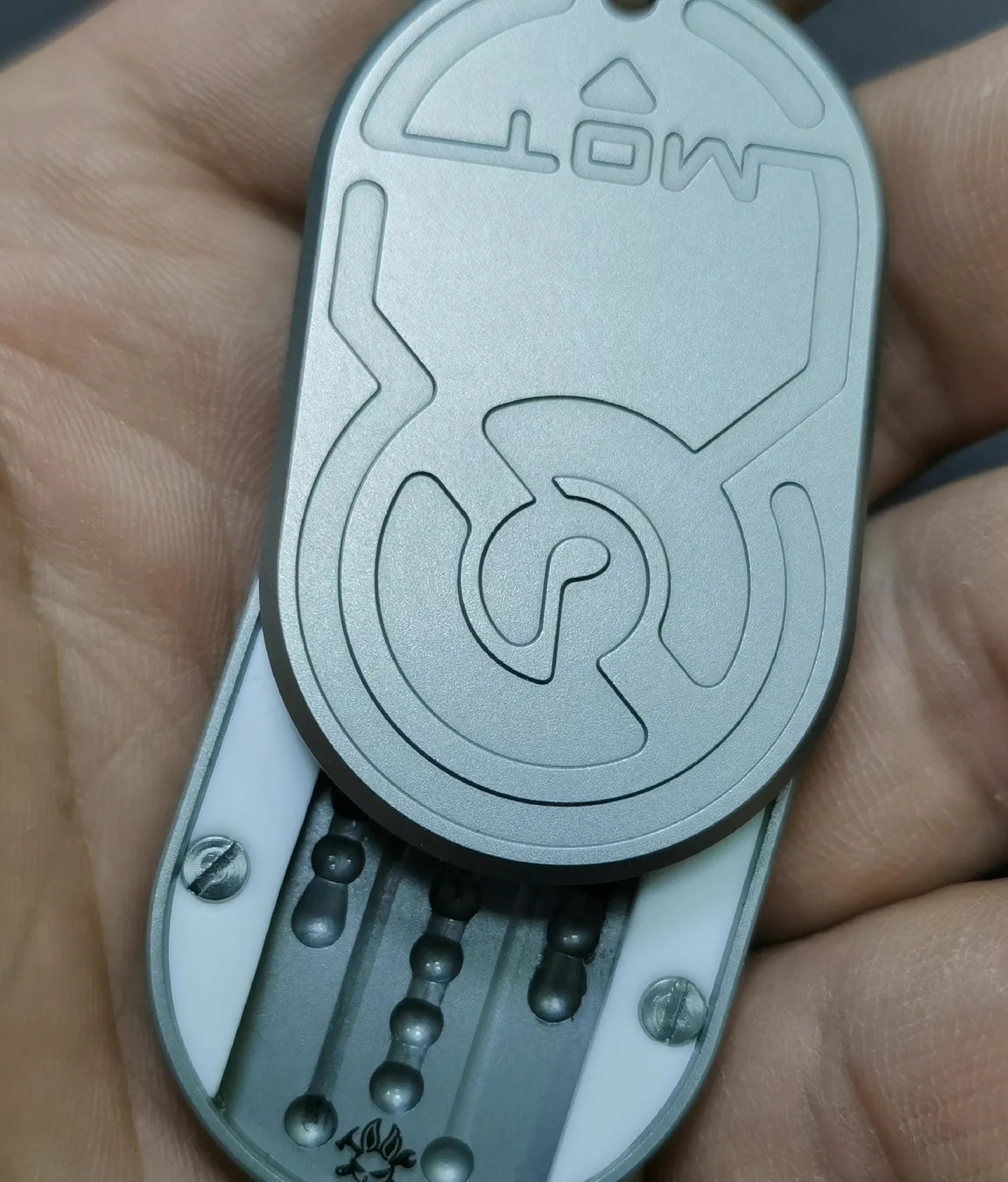 Used EDC Mot Rhythm, Stainless Steel Primary Color Sandblasting, No Bumping, Normal Play, Very Good Feel