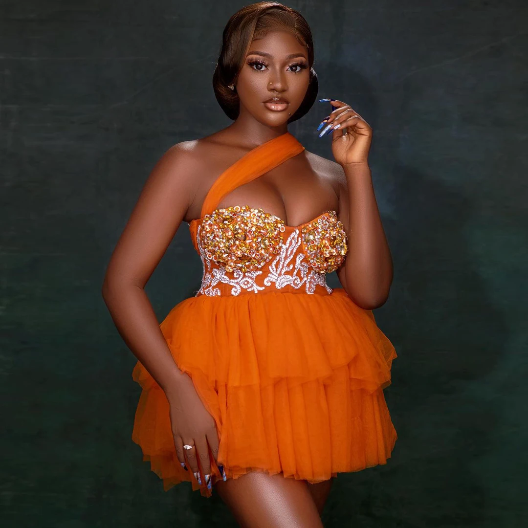 ชุดเดรสผ้าบางสีส้มฟูฟ่องสำหรับงานพรอมมินิเดรสแขนเดียวประดับคริสตัลลูกปัดแอฟริกาชุดงานค็อกเทล Aso EBI แบบทางการสำหรับงานปาร์ตี้