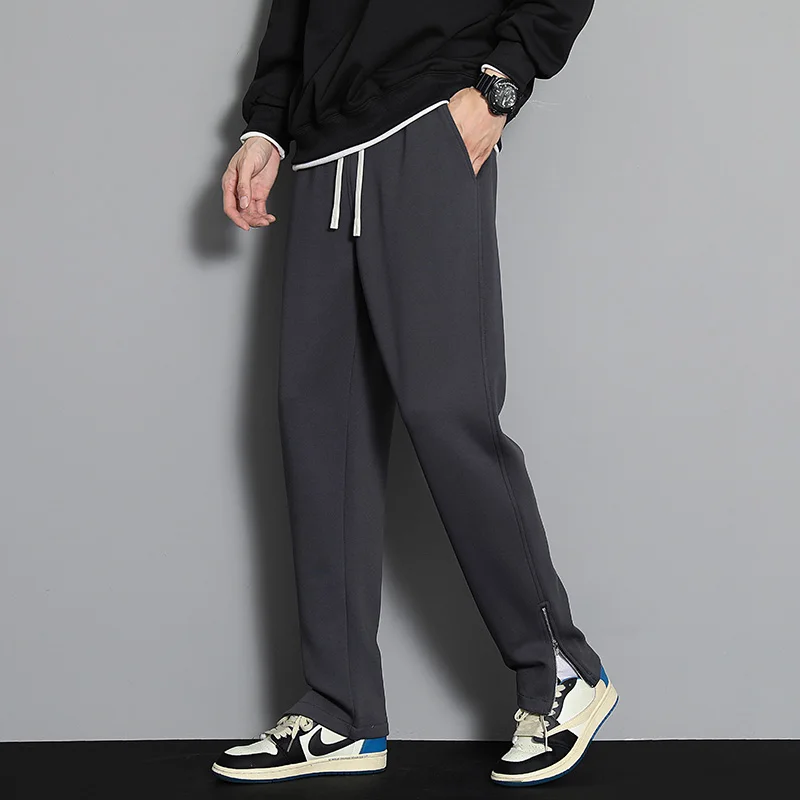 ملابس رياضية برباط بخصر مطاطي للرجال ربيع الخريف بنطلون رياضي متين بنطال واسع الساق مستقيم للرجال بناطيل عصرية فضفاضة غير رسمية