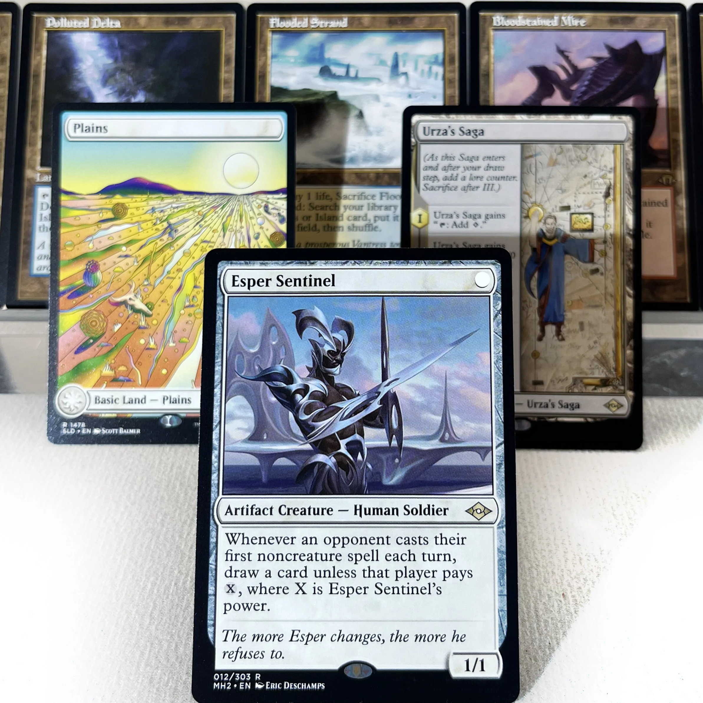 

Коллекционные карты Magic: The Gathering MAR SPE HOLO16-03 (прокси-карты) - Reanimate, Basic Lands, Brock Venom, Eddie Esper, Sentinel, Urza's Saga
