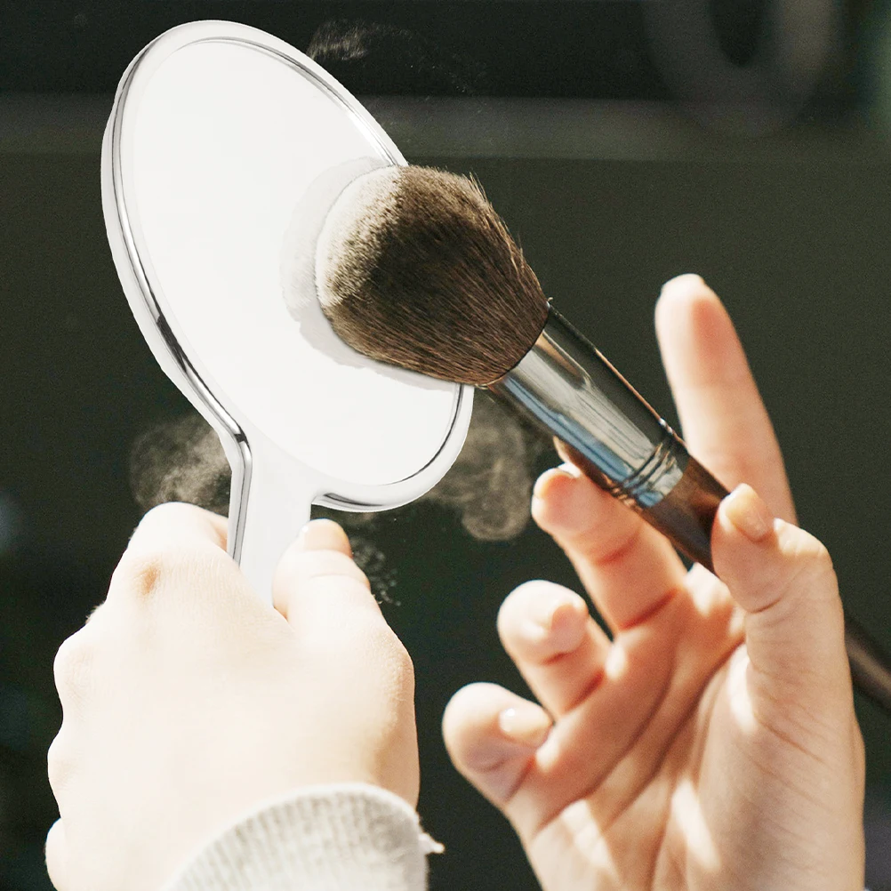 

Electroplated Silver Portable Hand Mirror Lightweight High Clarity Handheld Mirror for Makeup and Beauty Use