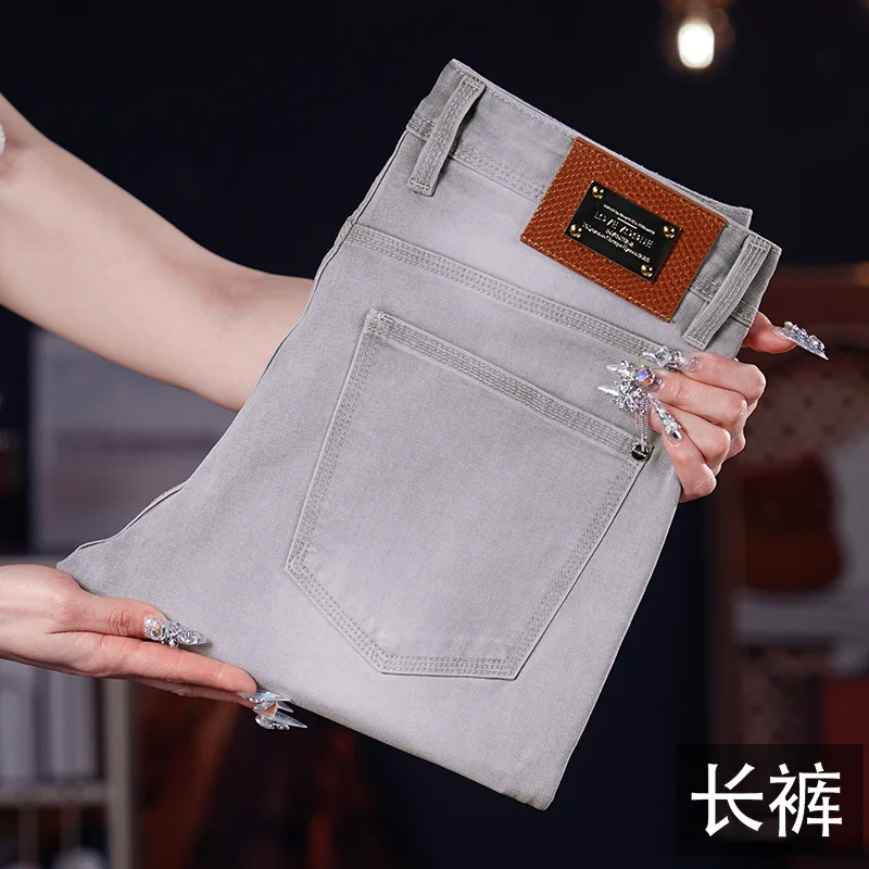 

Summer thin light gray jeans for men, slim fit with small feet, fashionable trend, casual, light luxury pants