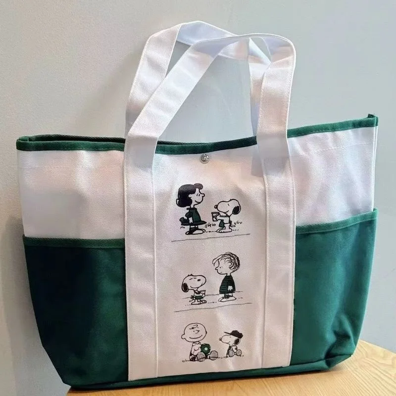 Nuevo 2025 Snoopy, bolso de mano pequeño y fresco con estampado de gran capacidad, estilo informal perezoso, bolso de hombro de viaje para niñas, regalo de Año Nuevo