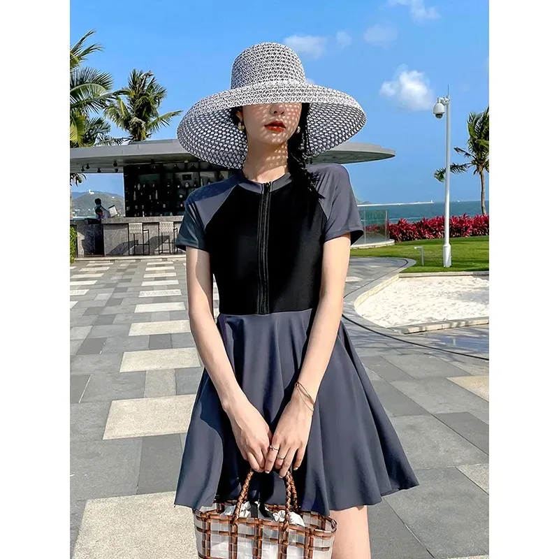 

Women's Tummy Control Skirted One Piece Swimsuit Zip Front Short Sleeve Rash Guard with Boyshorts for Swimming