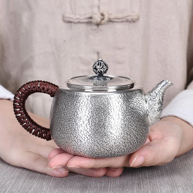 

Do old plum blossom pick sterling silver pot pure handmade foot silver 999 boiling bubble teapot Japanese Kung fu tea pot single