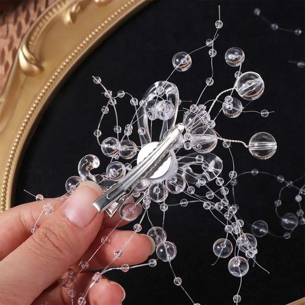 acessorio-de-cabelo-de-noiva-elegante-e-luxuoso-com-borlas-cristais-e-contas-transparentes-–-tiara-de-casamento