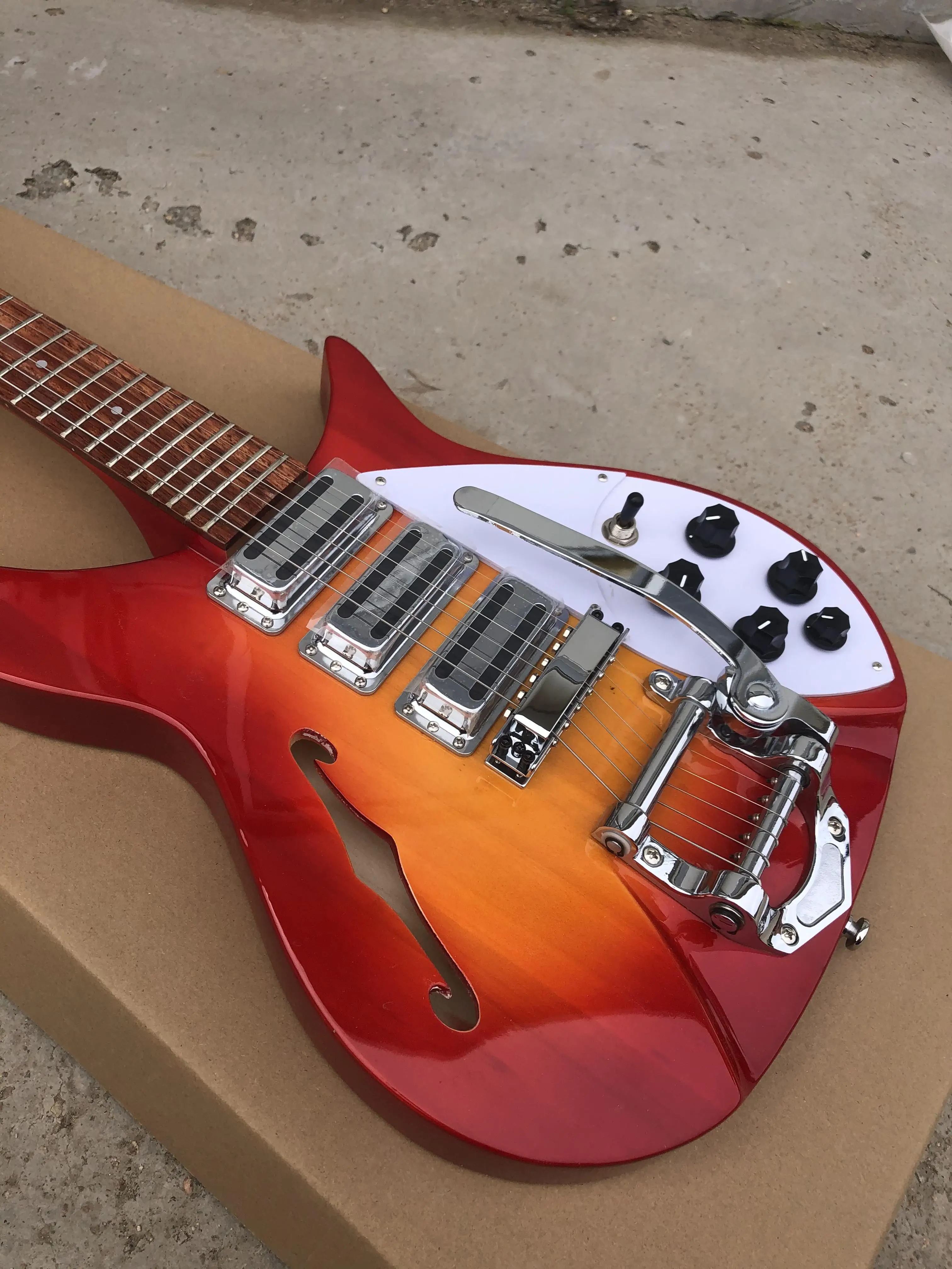 Electric Guitar with Rickenbackerf Hole, Cherry Sunburst Color, RosewoodFretboard, Tremolo System, Semi-Hollow Body Instrument,