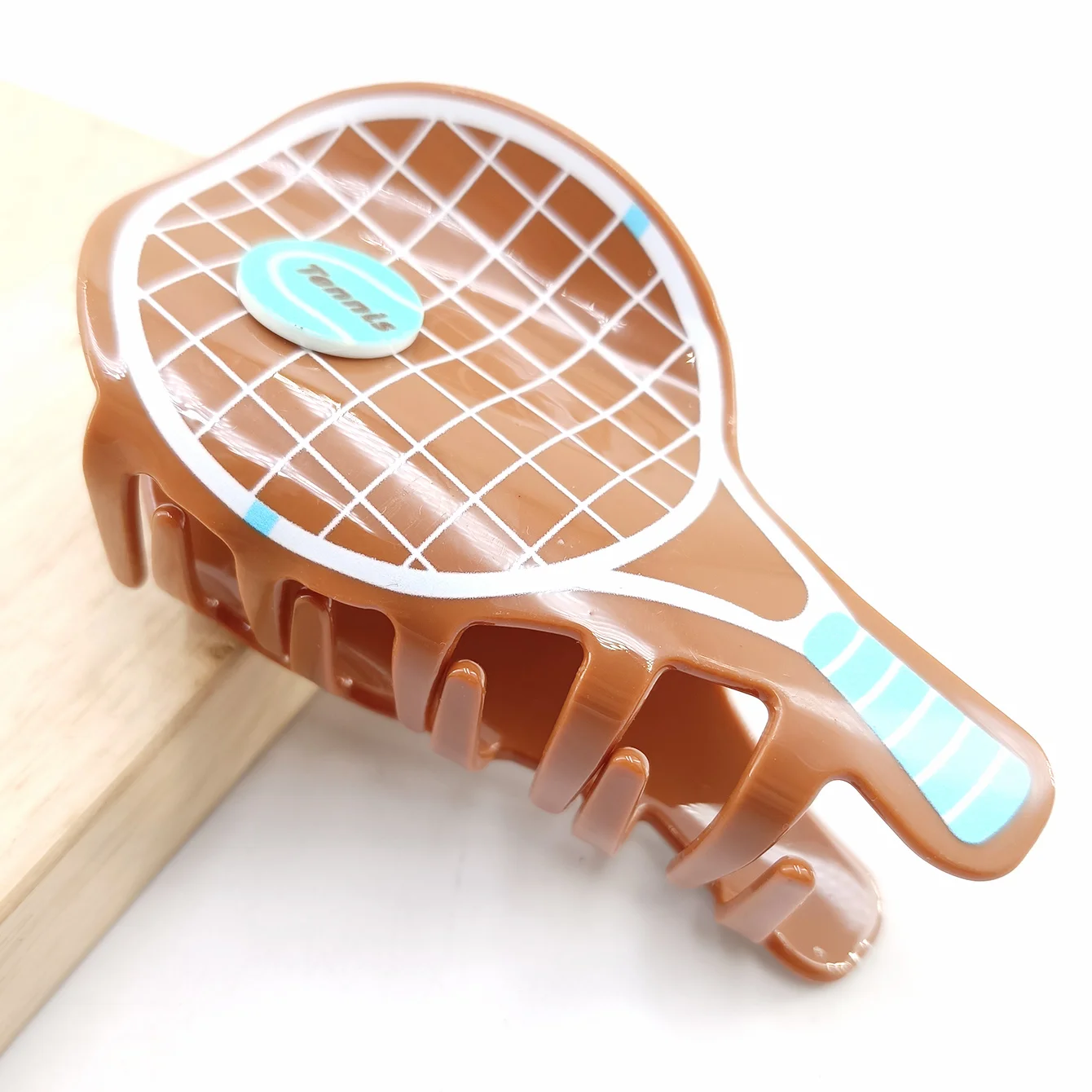 قطعة واحدة من إكسسوارات مضرب التنس الرياضية اللطيفة والإبداعية، مشبك على قرص الشعر على شكل قرش على إكسسوارات الشعر