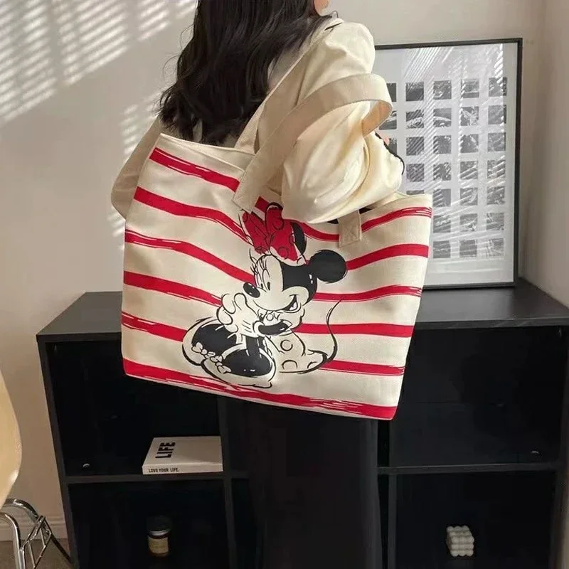 

Hot Disney Mickey Minnie Cute Cartoon Large Capacity Canvas Bag for Female Students To Hold Books Tote Mommy Bag