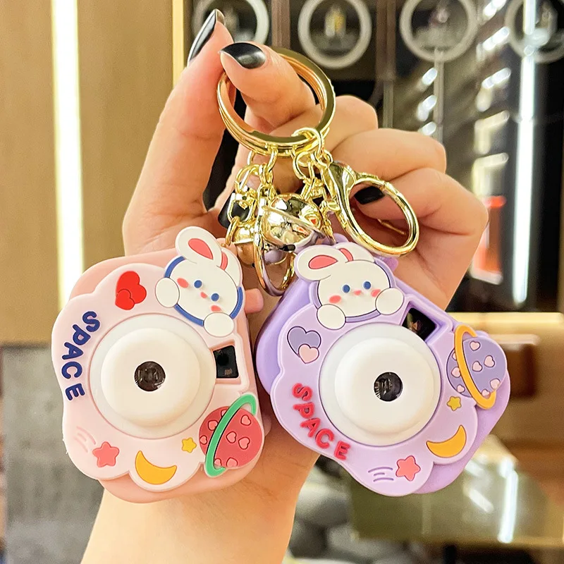 Minso  Projection camera, illuminated keychain, couple bag, pendant, cartoon creative key chain pendant