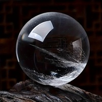A stunning and rare white fused crystal ball - a chic bohemian-style home/office decoration for Christmas.