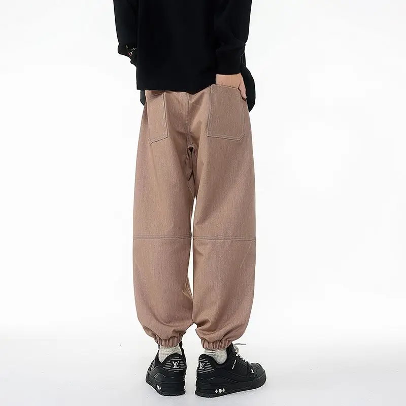 Pantaloni da uomo stile retrò taglie forti versatili per la primavera e l'autunno pantaloni allacciati alla caviglia pantaloni da lavoro casual larghi e dimagranti