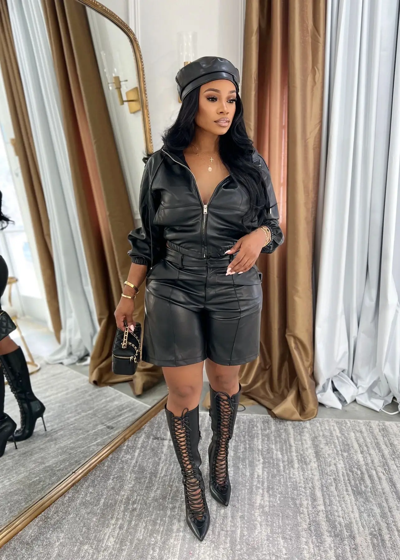 ชุดเซ็ตหนัง PU สีดำสุดหรู 2 ชิ้น เสื้อแจ็คเก็ตมีฮู้ดแบบซิป กางเกงขาสั้น แฟชั่นฤดูใบไม้ร่วง-ฤดูหนาว 2026 สไตล์เรียบง่ายแนวสตรีท