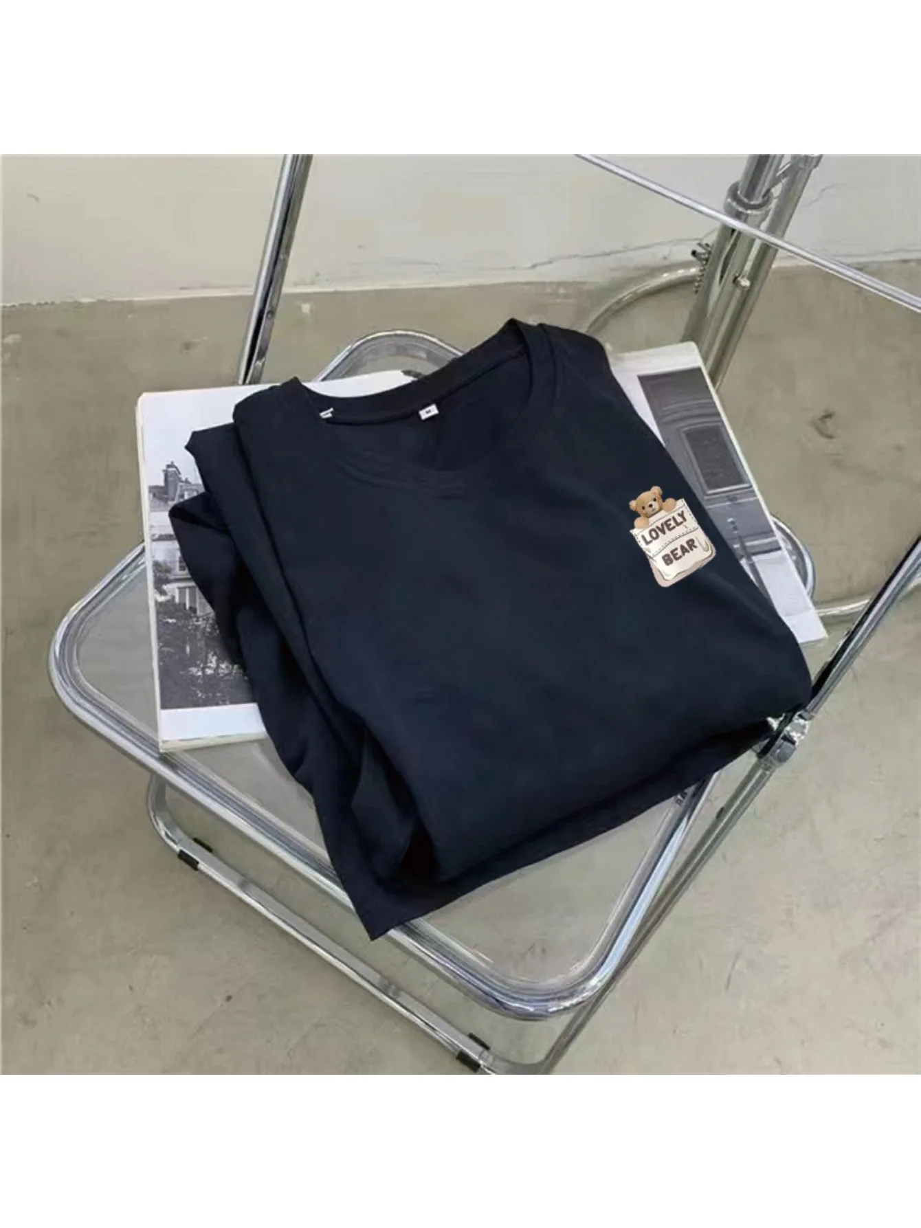 เสื้อยืดแขนสั้นกระโปรงผู้หญิงในฤดูร้อนขนาดใหญ่กระโปรงหลวมความยาวกลางลำลองชุดผ่าเหนือเข่า