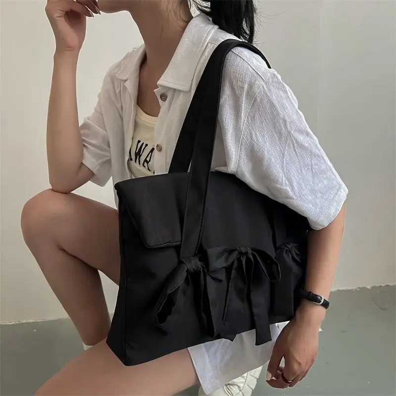 2023 Fashion New Nylon Material One Shoulder Women Bag Bow Fold Designer Handbag Student Commuter Portable Laptop Bag For Women