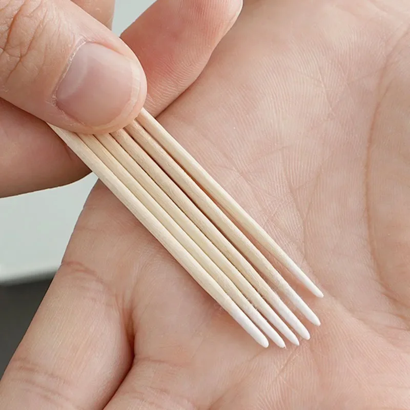 100 pezzi unghie tampone di legno bastoncini puliti punta di bocciolo testa di cotone in legno Manicure dettaglio correttore strumento di rimozione dello smalto per unghie